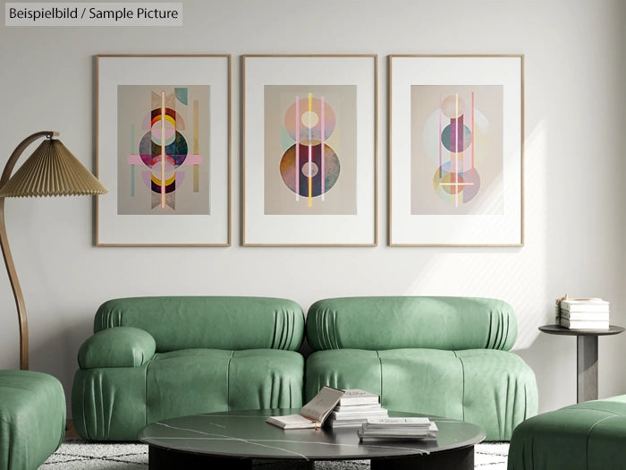 Contemporary living room with green sofas, a modern floor lamp, and three abstract geometric art pieces on the wall.