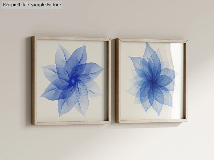 Two framed abstract artworks featuring blue floral designs on a light background, hung side by side on a neutral wall.