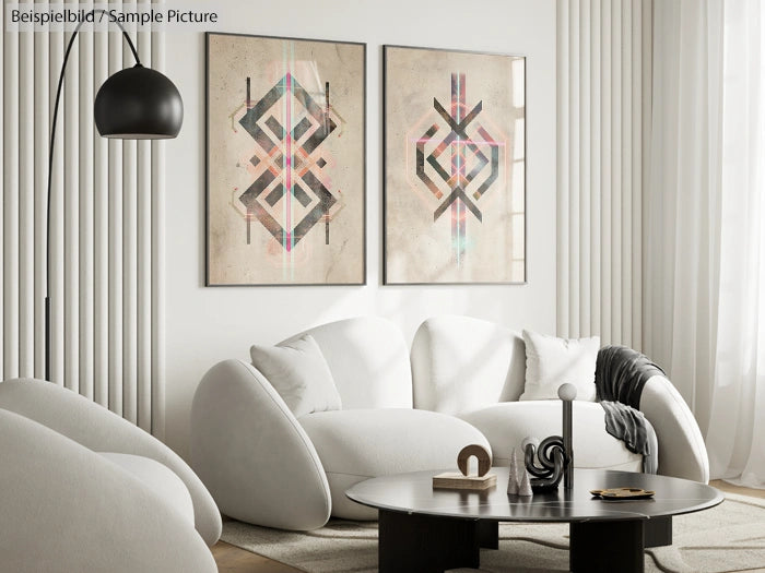 Modern living room with white sofa, abstract art, and a round black coffee table under a pendant lamp.