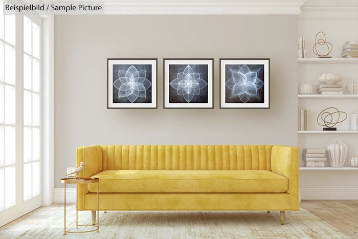 Modern living room with yellow couch, abstract art on wall, and minimalist decor on white shelves.