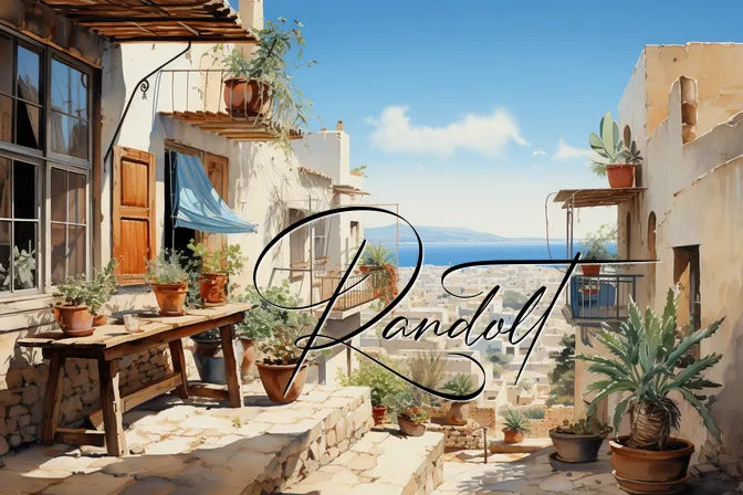 Mediterranean village with stone pathways, potted plants, and a blue sky, overlaid with cursive text 'Randolf'.
