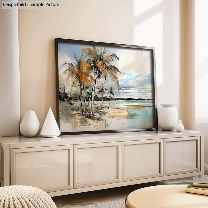 Framed tropical beach painting with palm trees, displayed on a modern white sideboard in a sunlit room.