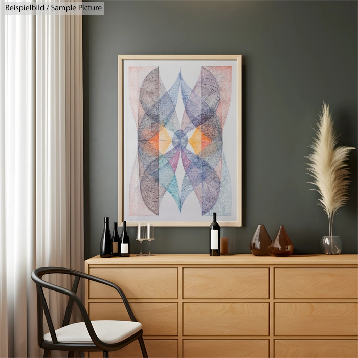 Modern interior with geometric artwork, wooden dresser, decorative bottles, and pampas grass against a dark wall.