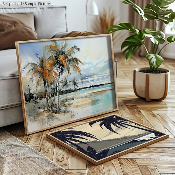 Two framed paintings of tropical palm trees on a wooden floor, with a potted plant, in a bright room with a parquet floor.