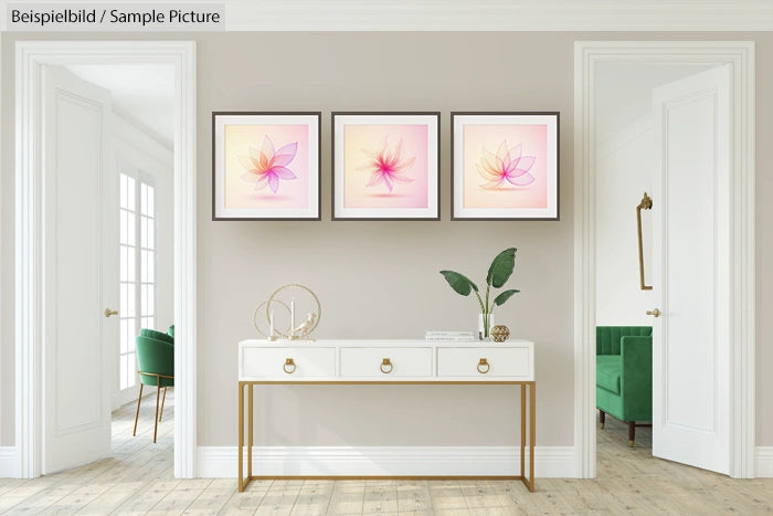 Modern interior with a white console table, abstract floral artwork on wall, and green armchairs in the background.