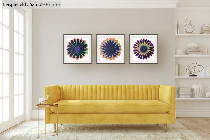 Modern living room with a yellow sofa and three colorful abstract flower paintings on the wall.