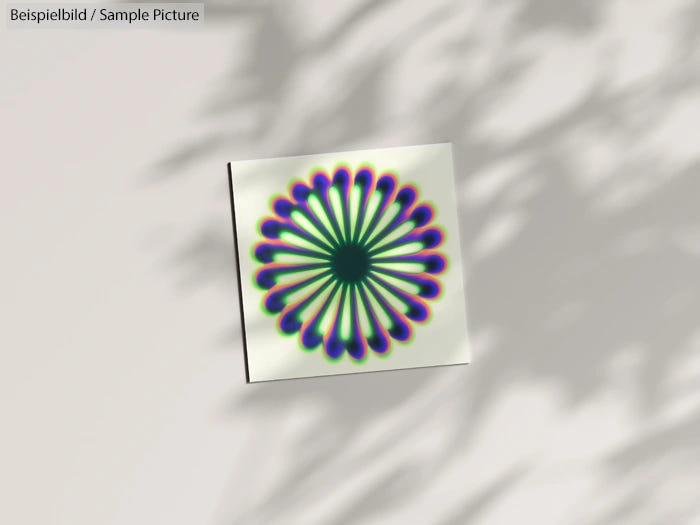 Colorful abstract floral pattern on a square canvas with light and shadow play in the background.