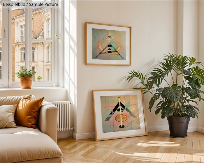 Bright living room with beige sofa, geometric abstract art, large window, and a potted plant next to framed paintings.